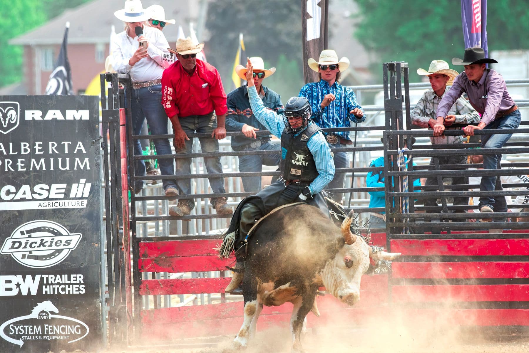 PBR STOCKYARDS SHOWCASE: rodeo athlete competing under arena lights.
